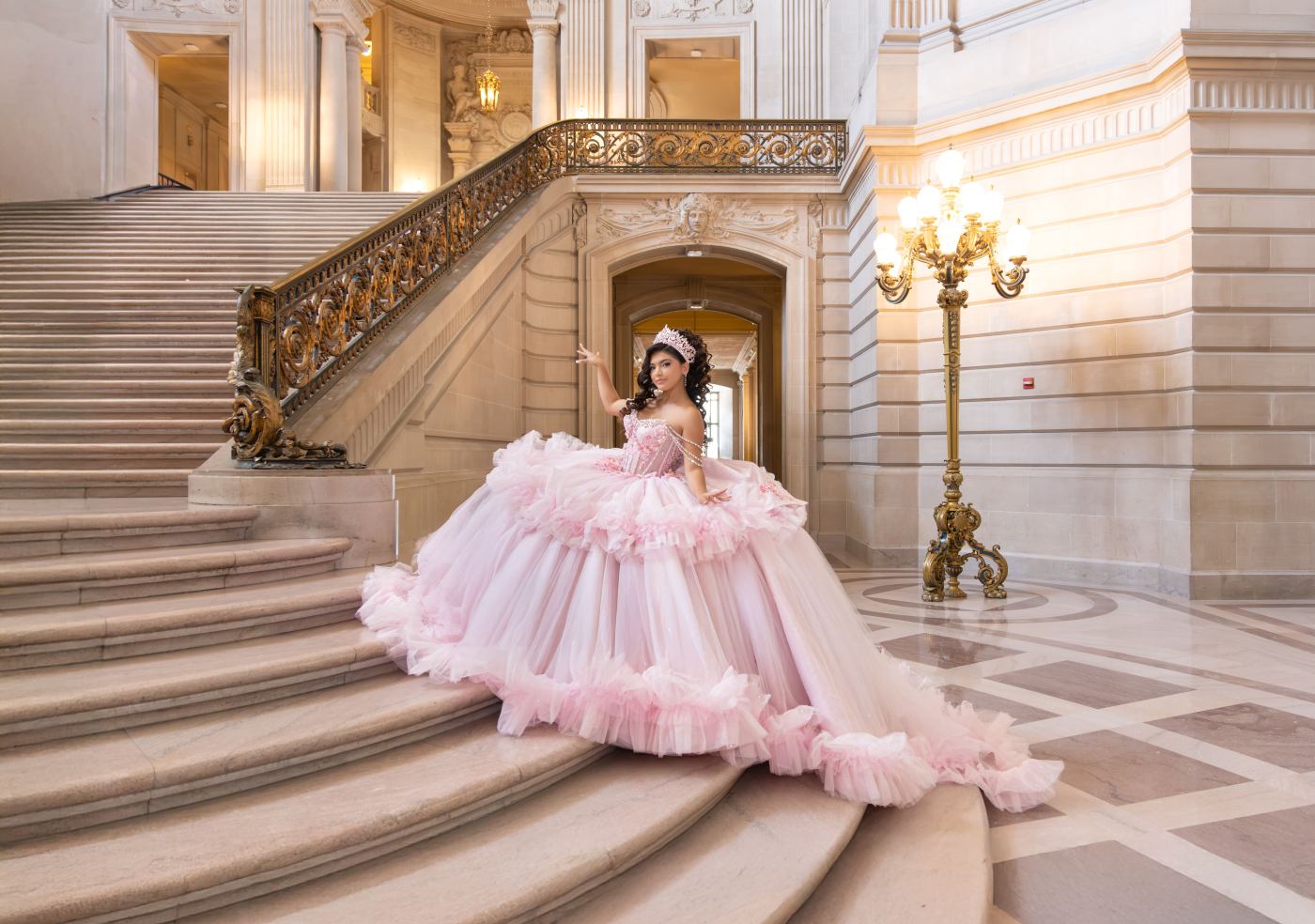 Quinceañera portrait in a grand staircase setting
