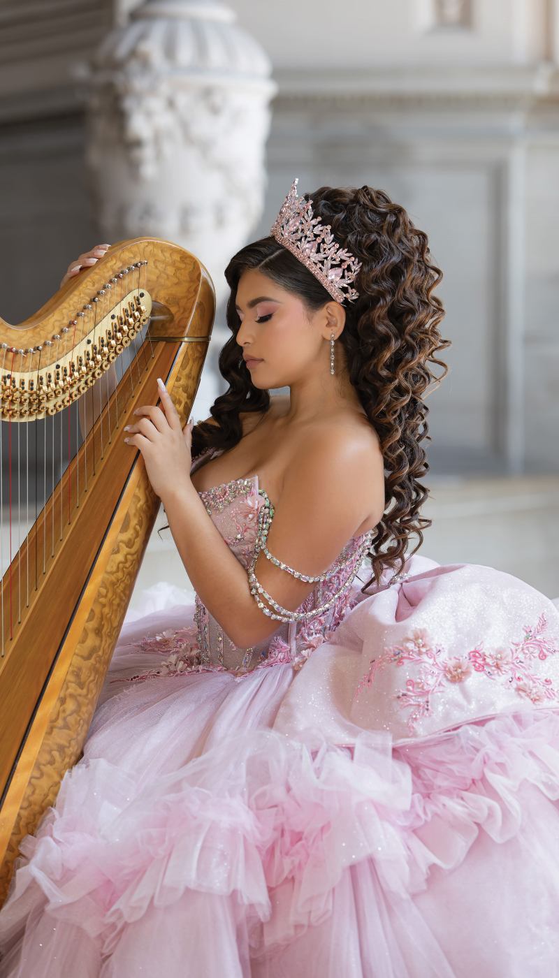 Quinceañera portrait with a harp