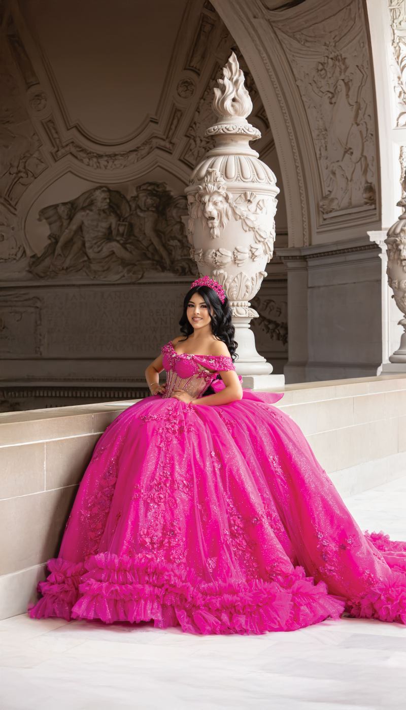 Quinceañera in a bright pink gown